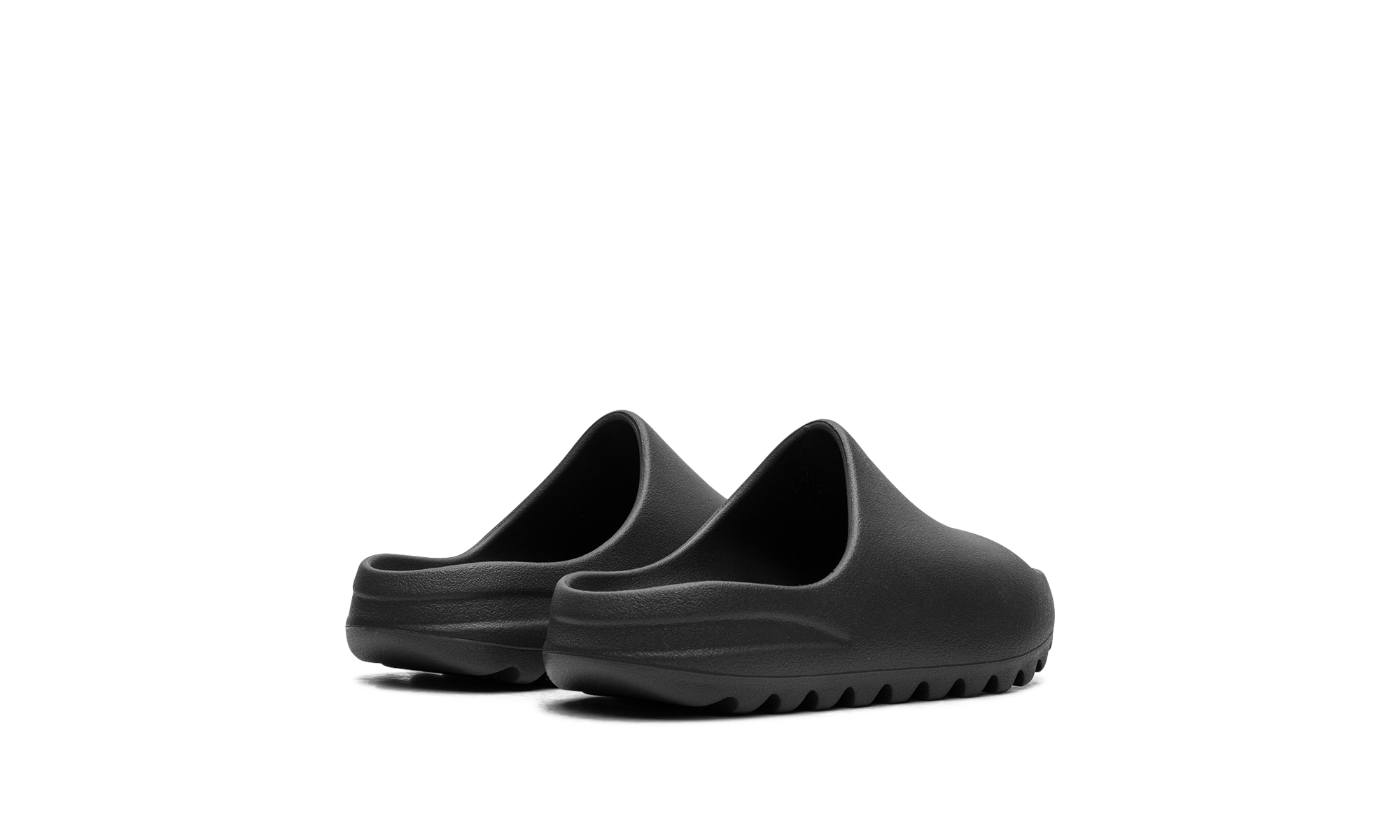 adidas yeezy slide dark onyx kids+ID5104+diagnol right behind view