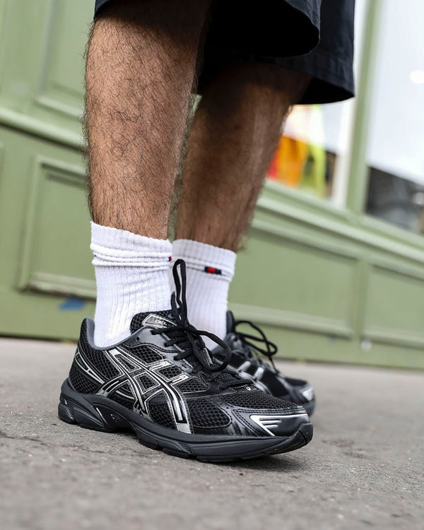 ASICS Gel-1130 Black Pure Silver, Lifestyle View 1, SKU 1201A906-001