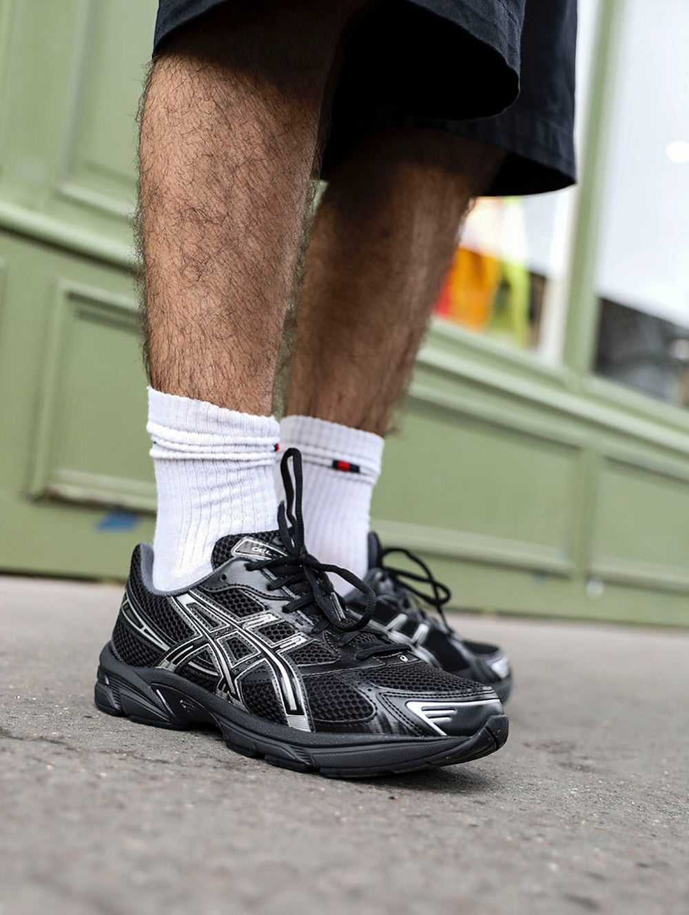 ASICS Gel-1130 Black Pure Silver, Lifestyle View 1, SKU 1201A906-001