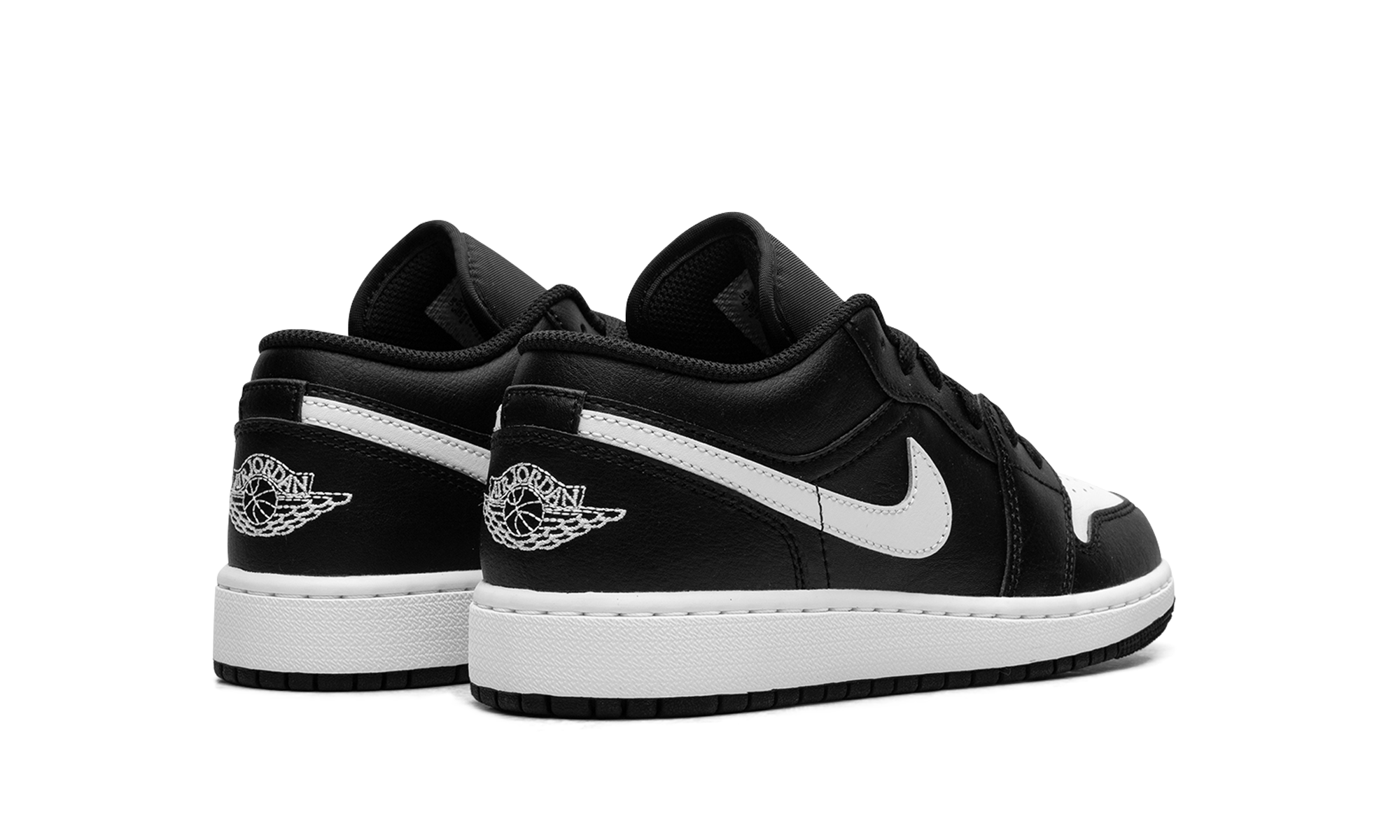 jordan 1 low black summit white gs+553560-043+diagnol right behind view