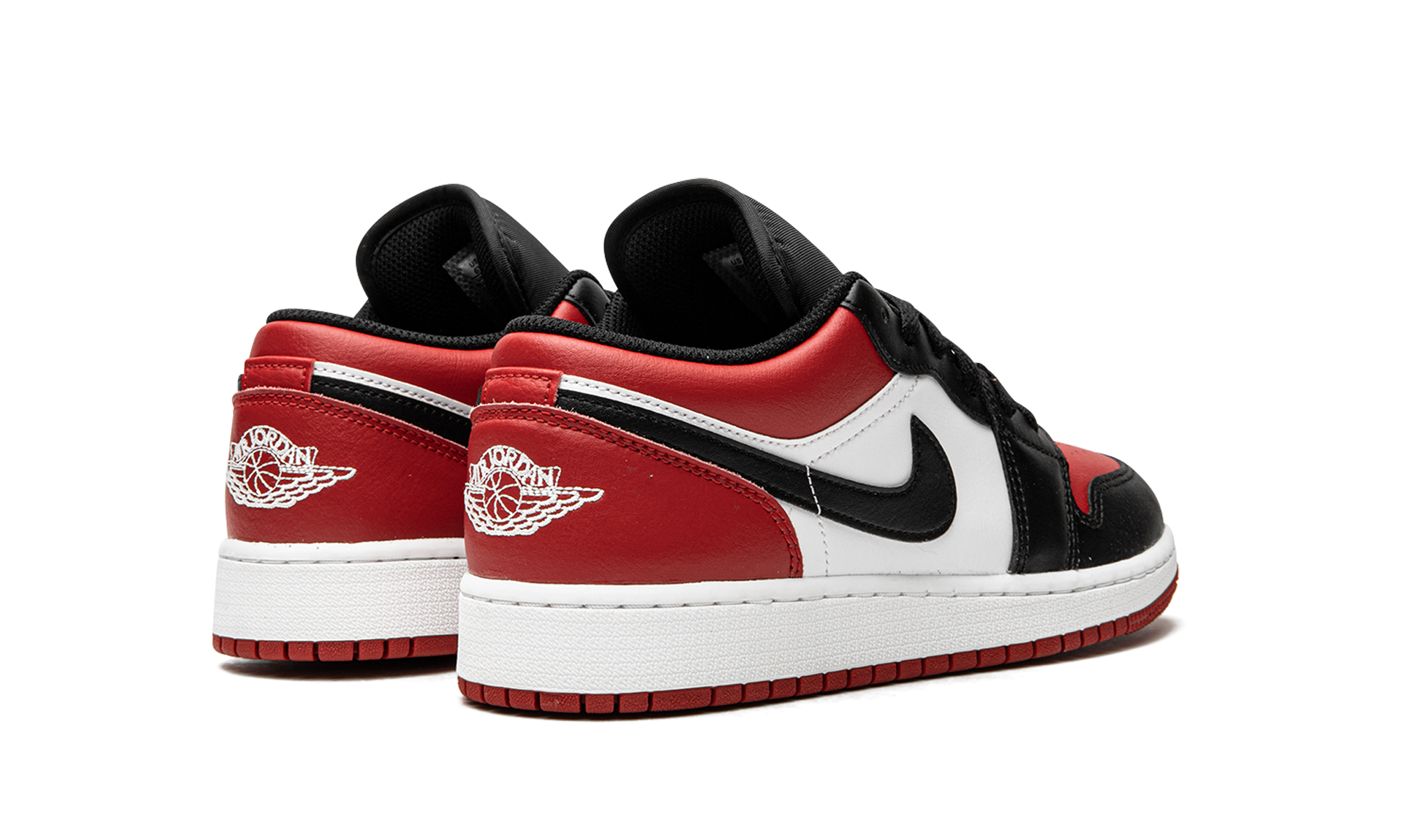 jordan 1 low bred toe gs+553560-612+diagnol right behind view