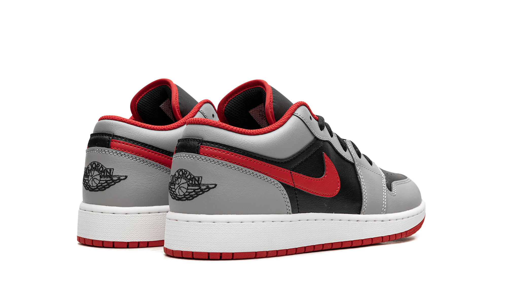 jordan 1 low cement fire red gs+553560-060+diagnol right behind view