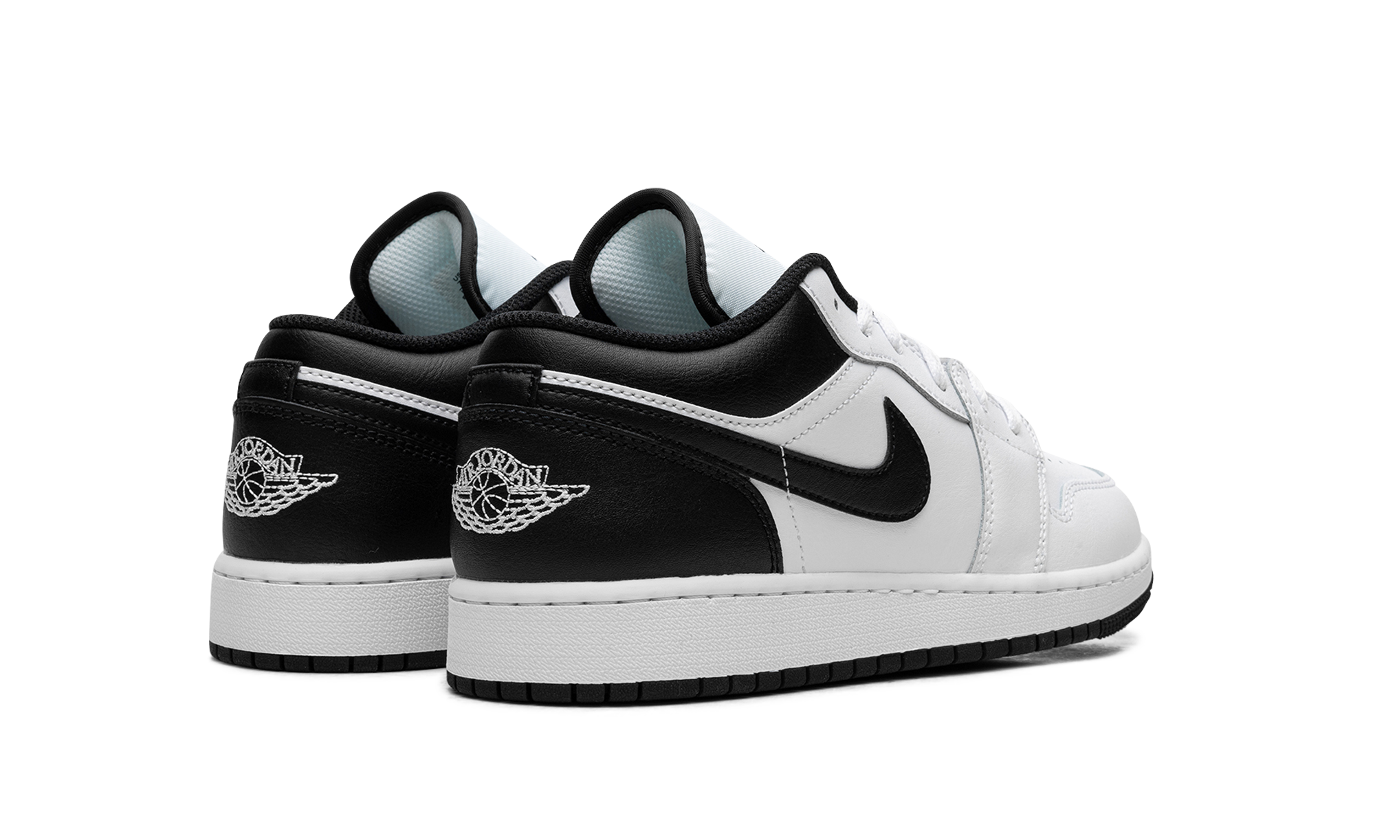jordan 1 low white black gs+553560-132+diagnol right behind view