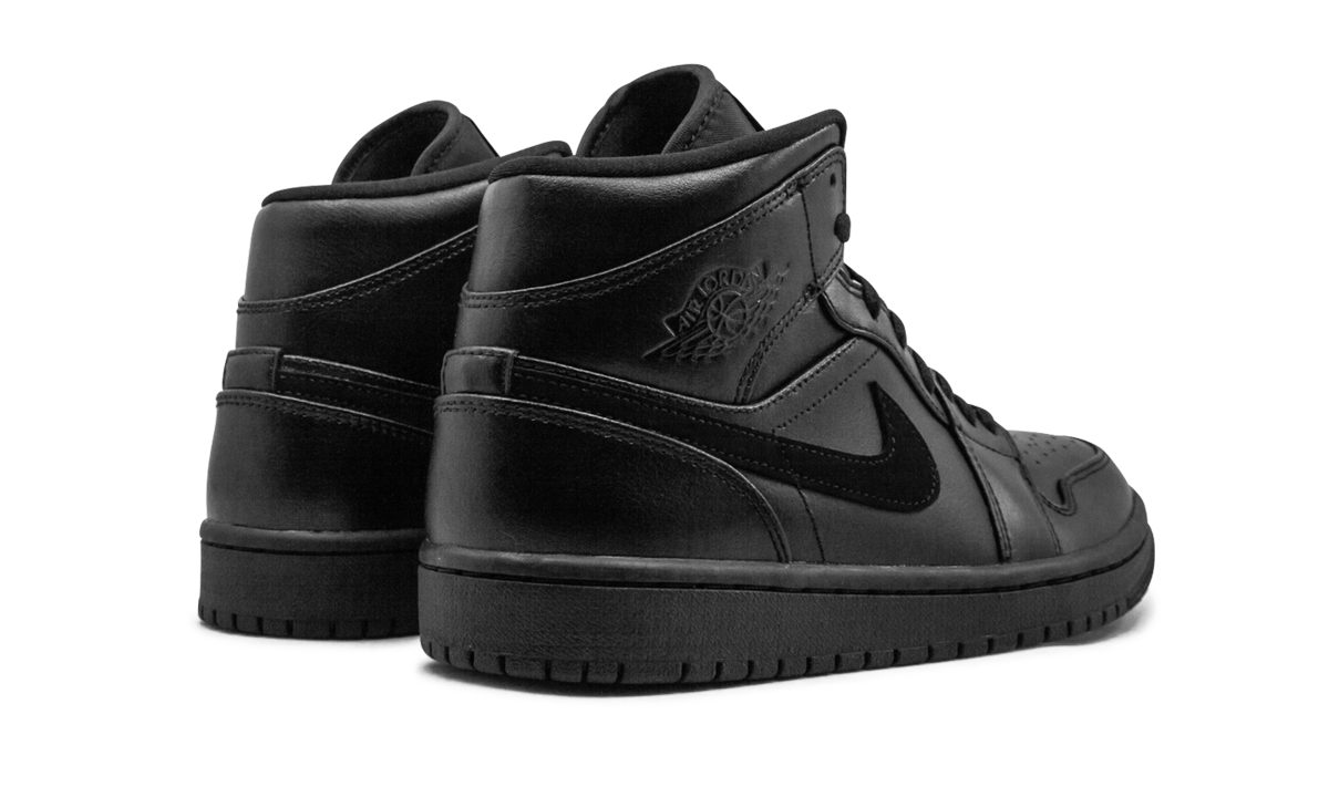 jordan 1 mid black+554724-090+diagnol right behind view