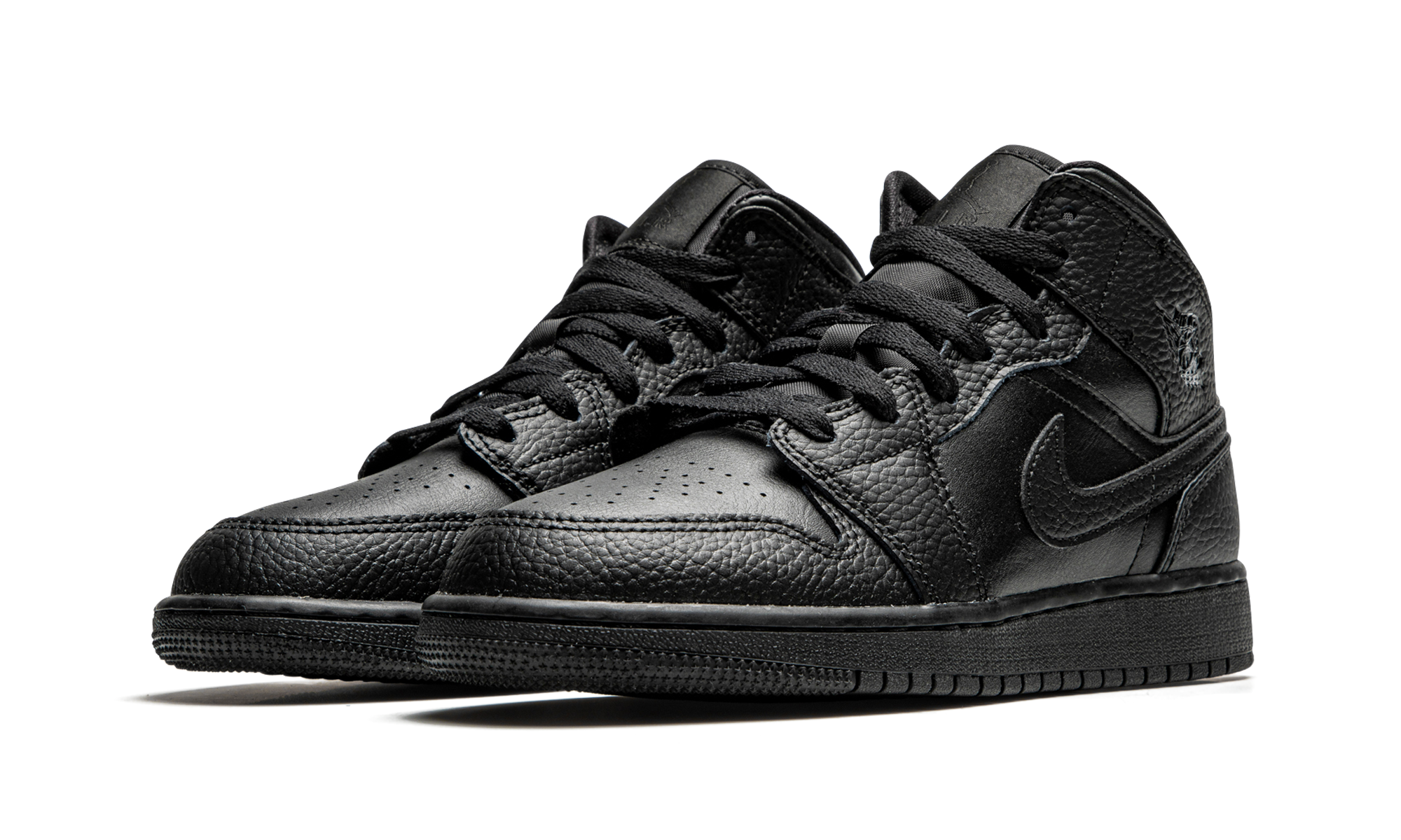 jordan 1 mid black gs+554725-091+diagnol left view