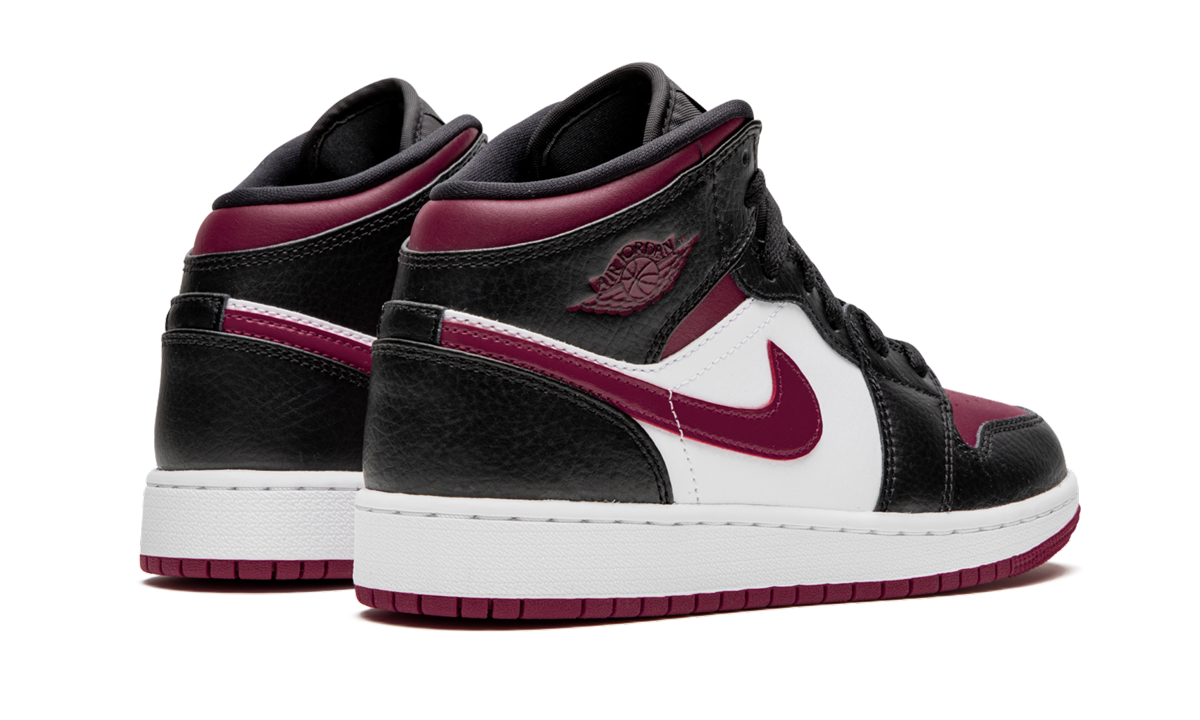 jordan 1 mid bred toe gs+554725-066+diagnol right behind view