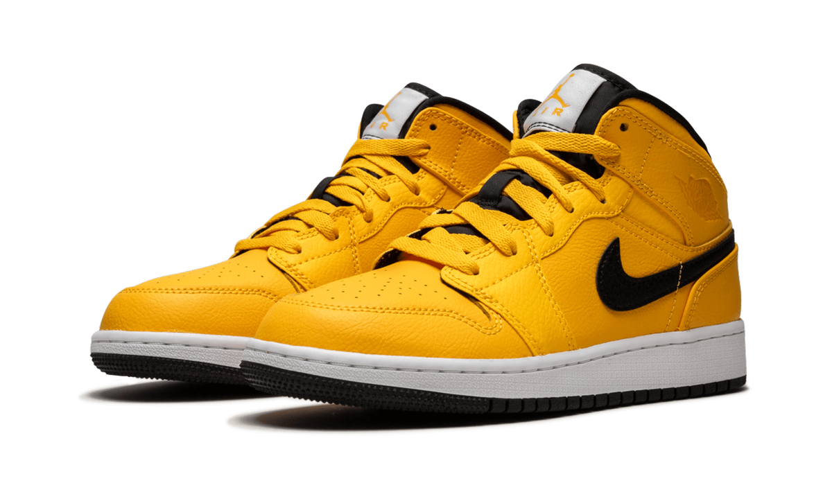 jordan 1 mid university gold black gs+554725-700+diagnol left view