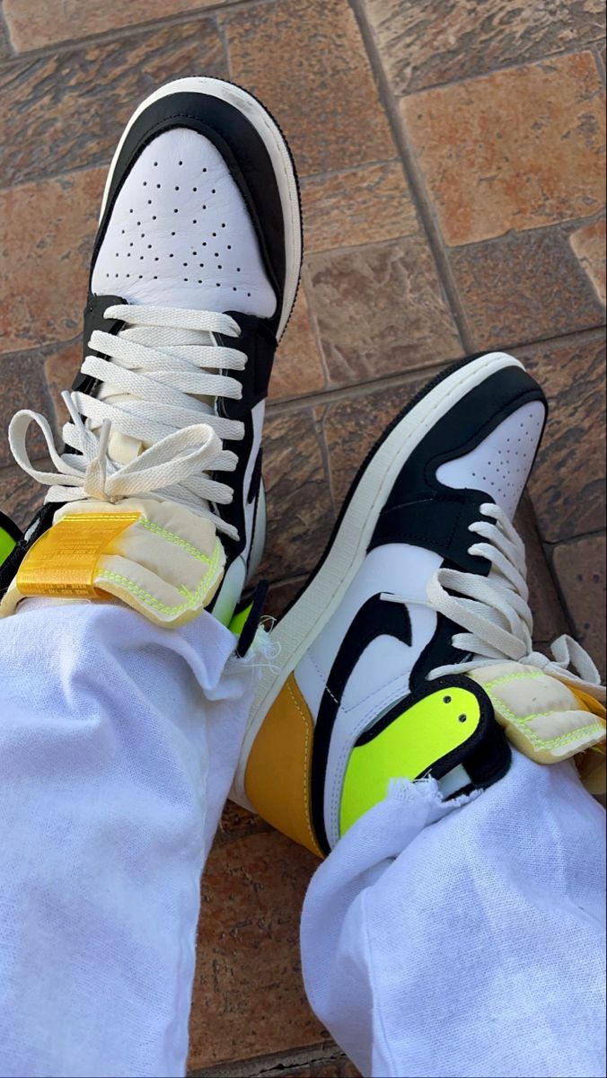 Jordan 1 Retro High White Black Volt University Gold, Lifestyle View 2, SKU 555088-118