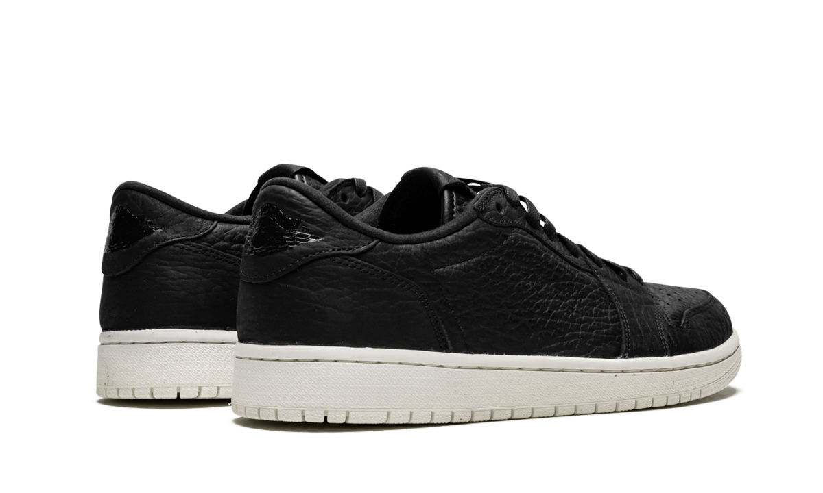 jordan 1 retro low swooshless black+848775-005+diagnol right behind view