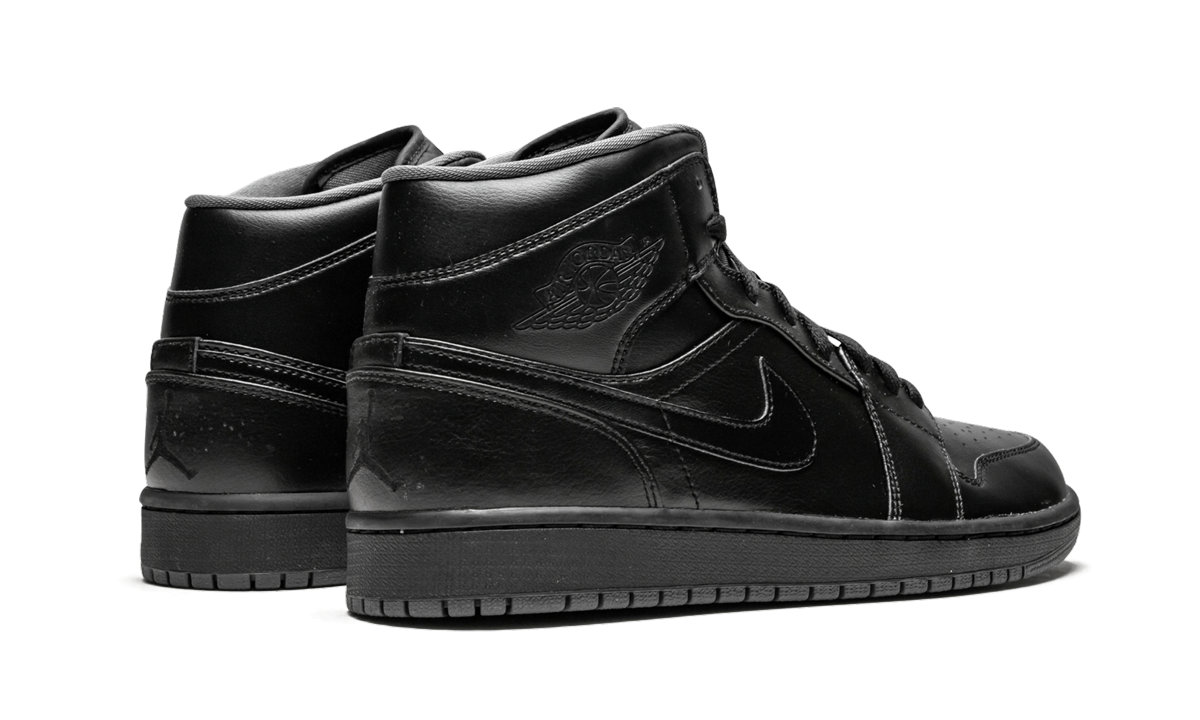jordan 1 retro mid black 2016+554724-021+diagnol right behind view