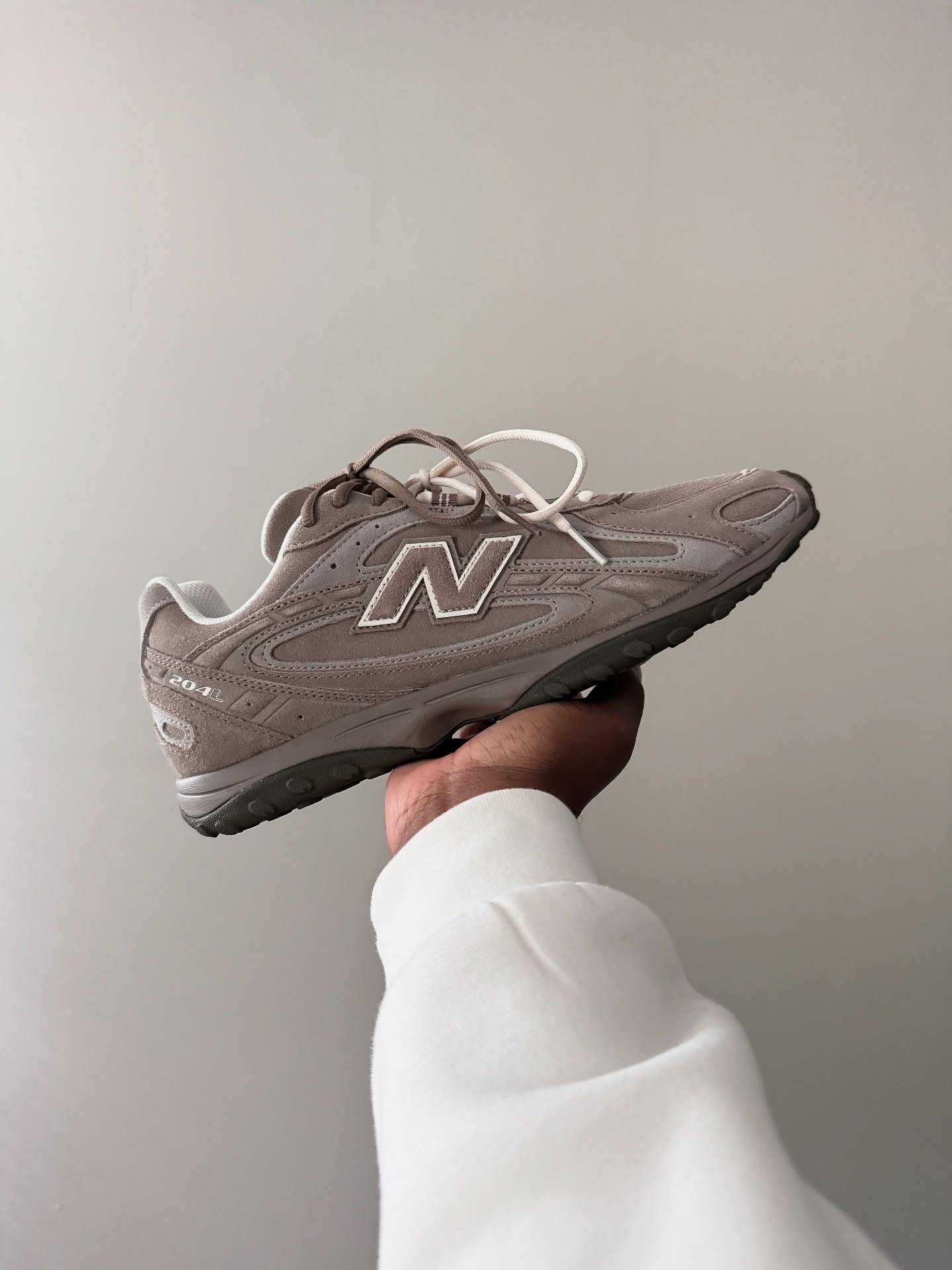 New Balance 204L Mushroom Arid Stone, Lifestyle View 1, SKU U204LMMA
