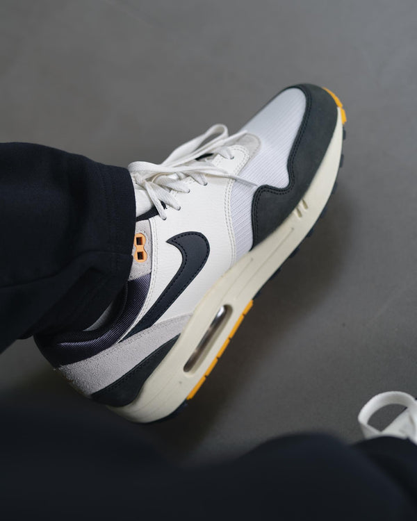 Nike Air Max 1 Athletic Department Light Bone University Gold, Lifestyle View 2, SKU FN7487-133