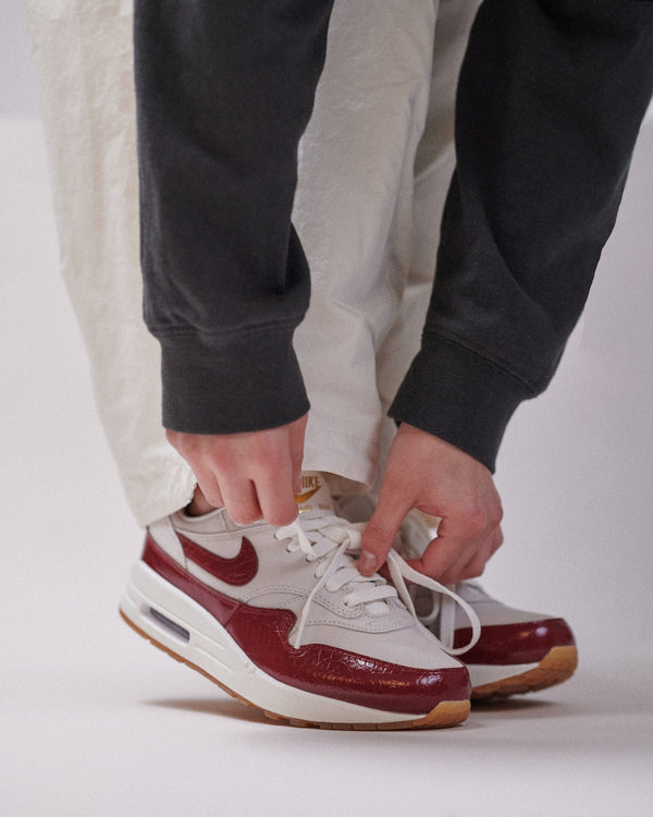 Nike Air Max 1 LX Team Red (Women's), Lifestyle View 4, SKU FJ3169-100