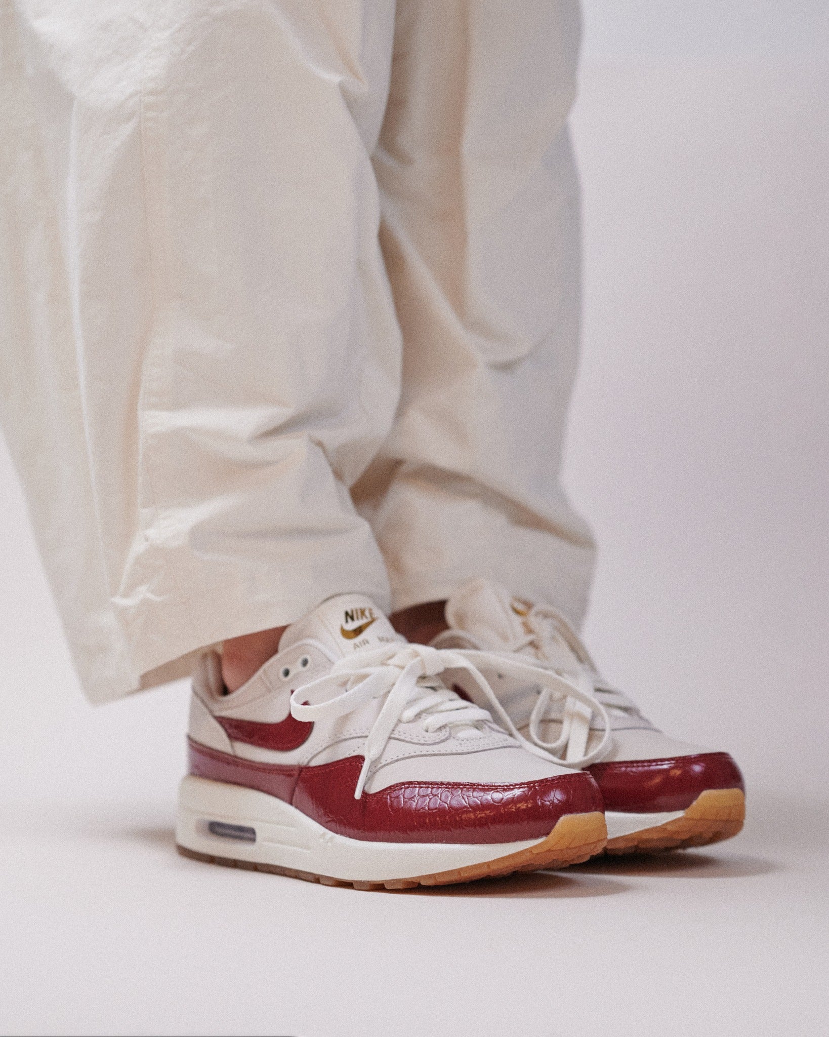 Nike Air Max 1 LX Team Red (Women's), Lifestyle View 3, SKU FJ3169-100