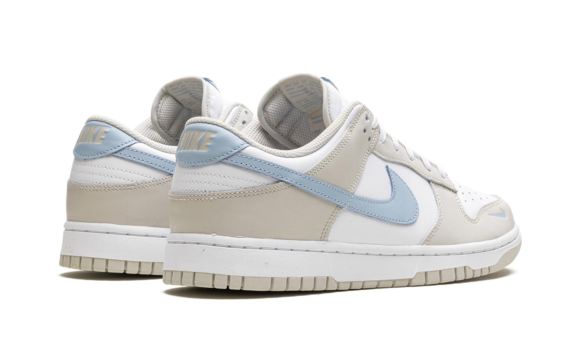 nike dunk low light bone armory blue women s+HF0023-100+diagnol right behind view