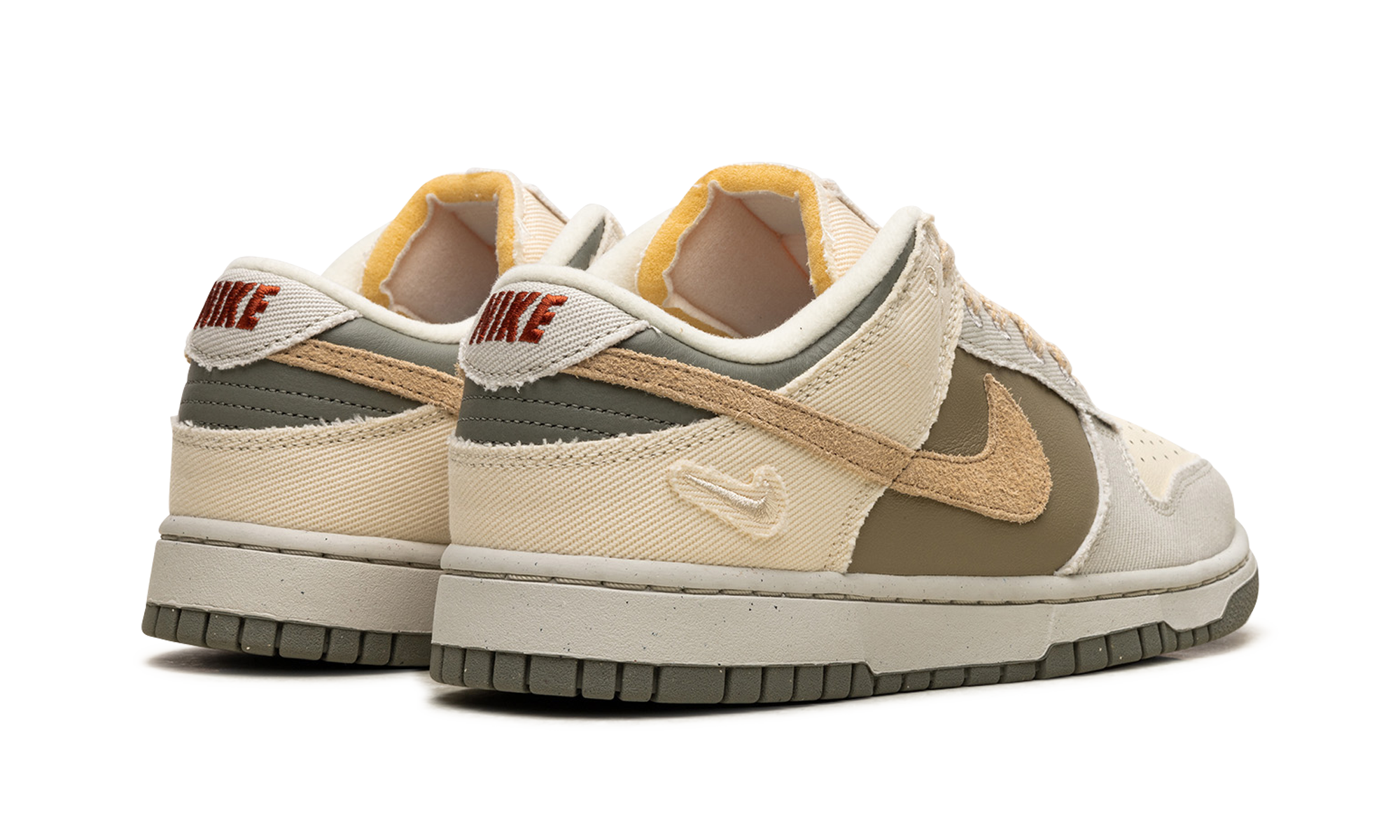 nike dunk low light bone dark stucco women s+FZ4341-100+diagnol right behind view