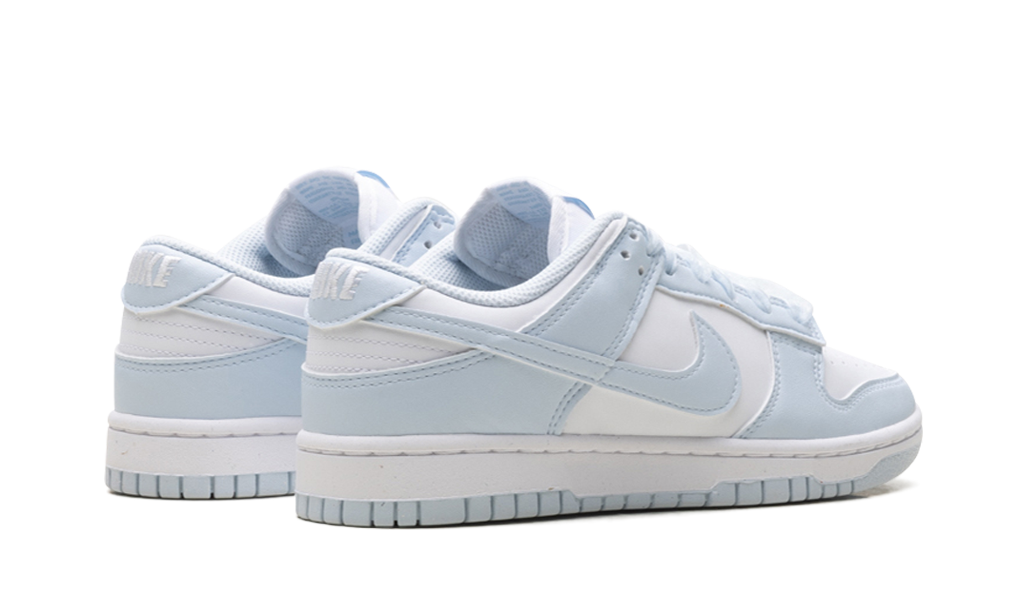 nike dunk low next nature white blue tint women s+IB7311-100+diagnol right behind view