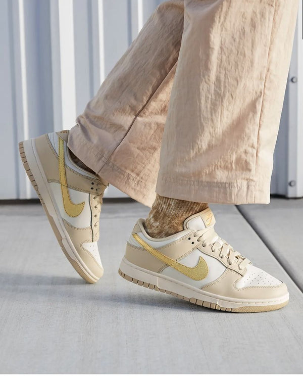 Nike Dunk Low Phantom Metallic Gold (Women's), Lifestyle View 1, SKU DX5930-001