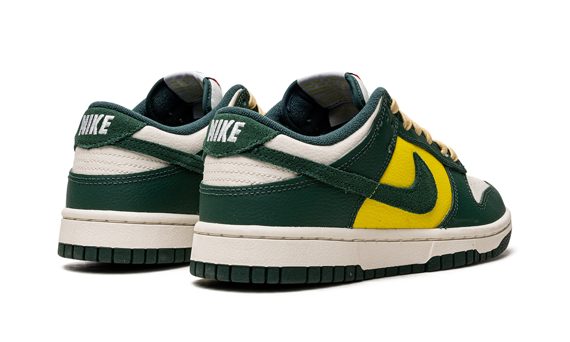nike dunk low se noble green women s+FD0350-133+diagnol right behind view