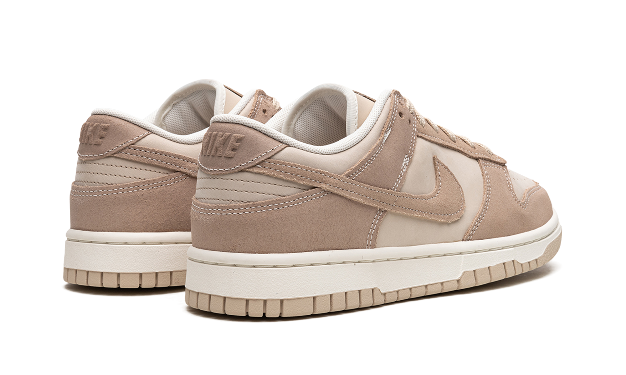 nike dunk low se sanddrift women s+FD0873-126+diagnol right behind view