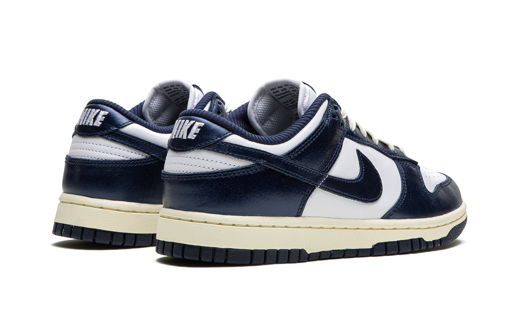 nike dunk low prm vintage navy women s+FN7197-100+diagnol right behind view