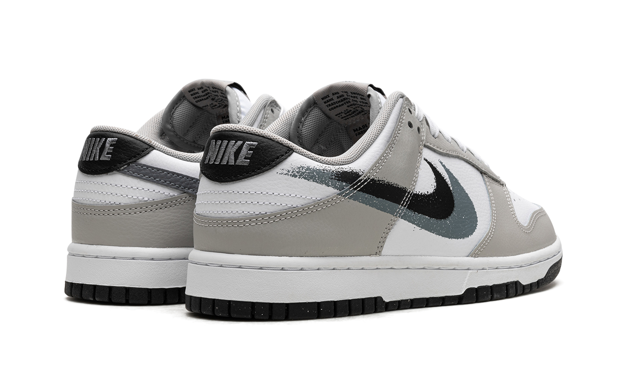 nike dunk low stencil swoosh+FD0661-100+diagnol right behind view